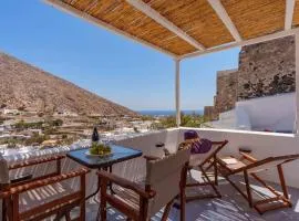 Cycladic traditional house with view