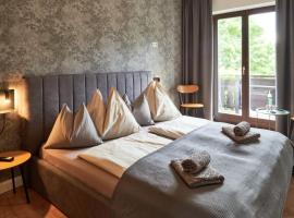 Jeff's - Rooms with a mountain view, bed and breakfast en Bad Goisern