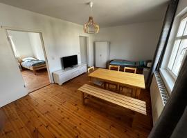 Große Monteurwohunung-Fewo, מלון בTrebbin