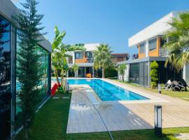 Villa Bozay Evinizdeki rahatlık huzurlusakin tatil, hotel in Kusadası