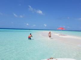 Batuta Maldives Inn, hotel i Thulusdhoo