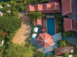 Garden Village Guesthouse & Pool Bar, feriebolig i Siem Reap