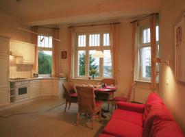 Villa Daheim - FeWo 04, cheap hotel in Kolpinsee