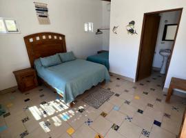 Playa Posada Eco Rooms, motel i Punta Arena