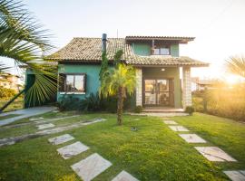 Casa na Barra de Ibiraquera: Barra de Ibiraquera'da bir tatil evi