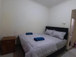 Homestay morelia، شقة في لابوان باجو