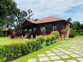 Rimba Alor Orchard Villas Villa Rimba，Kampong Alor Gajah的溫泉住宿