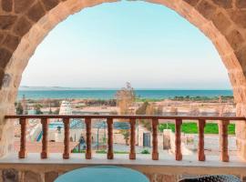 كمبوند قرية تونس，Tunis的有停車位的飯店