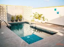 A beautiful farmhouse with a rooftop pool