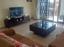 Freeve Suites Akright City Bwebajja, holiday rental in Buzzi