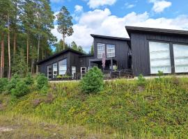 Moderne hytte Vrådal, feriebolig ved stranden i Vrådal