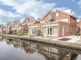 Lake View apartment with dishwasher close to Amsterdam، فندق في Uitgeest
