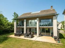 Lakeside property with spa on a nature reserve Butterfly Sound CW10