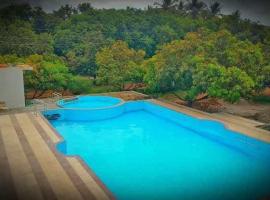 Capital O Murlidhar Farm Jamnavad, hotell i Junagadh