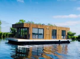 Surla Houseboat De Saek with tender, boat in Monnickendam