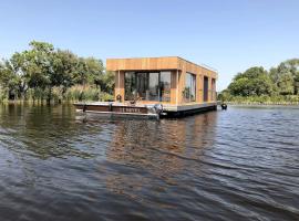 Surla houseboat "Nevel" Kagerplassen with tender:  bir kiralık tatil yeri