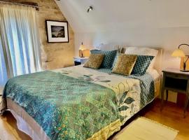 Esparoutis Chambres d'hôtes du Charme, bed and breakfast en Saint-Cybranet