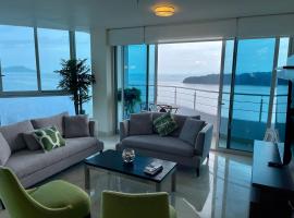 14F Luxury Resort Lifestyle Ocean Views, rental liburan di Playa Bonita Village