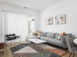 Modern Spacious Condo with Parking by Downtown Broadway