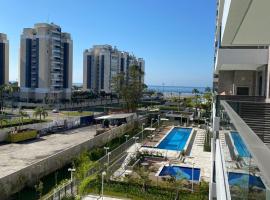 TULUM Bertioga - belo apartamento com vista para o mar, hotel a Bertioga