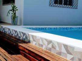 Casa aconchegante com piscina, בית נופש במקאפה