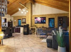 Ferienhaus Am Hang, Sky-Entertainment, DAZN, Carport, alles Barrierefrei, vila v destinaci Blankenburg