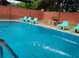 Beatiful Afamosa Golf Resort Private villa with pool 3 rooms lot 1280 bumiputra only, holiday home in Kampong Alor Gajah