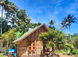 Johns wooden cottages, homestay di Sultan Bathery
