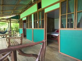 Cabinas vista isla del caño corcovado, habitación en casa particular en Drake