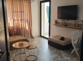 Charmant appartement - residence avec piscine entre Hammamet et Nabeul，納布勒的飯店