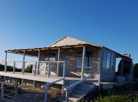 Beach Cabin - Vogelgezang, hotel di Bredasdorp