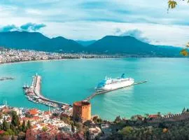 A dreamy luxury two-bedroom apartment with a special view of the forest, mountains and sunset