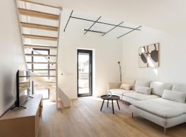 Modern and attractive 4-person Suite Silk, cabaña o casa de campo en Kamperland