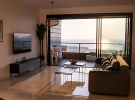 דירת 5 חדרים בבניין הכי טוב בעיר עם נוף מרהיב לים, alojamento para férias em Asdode