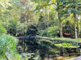 Prachtige chalet in het bos met sauna!, chalé alpino em Lanaken