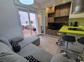 Apartamento con terraza y parking, holiday rental in Gijón