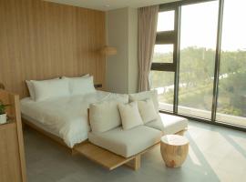 Golden Harvest Homestay, habitación en casa particular en Toucheng