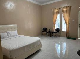 OYO 93033 Mutiara Homestay Syariah, hotel v destinaci Payakumbuh