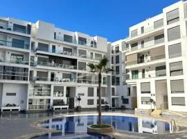 Chic 2BR Getaway with Large Balcony and Central AC