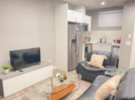 Cozy basement suite, casa de hóspedes em Calgary