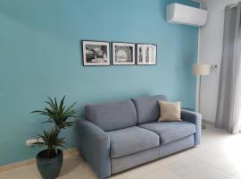 Étoile Court Apt - homey, spacious & private patio, holiday rental in Mġarr