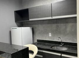 Apartamento de luxo no Hotel Stop-Inn Cristiano Machado, serviced apartment in Belo Horizonte