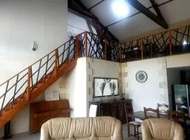Maison de charme aux grands volumes