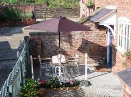 The Old Pantry at Hill Farm, gistiheimili í Penley