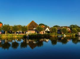 Appartement Morgenzon in Romantische stolp, hotel with parking in Warmenhuizen