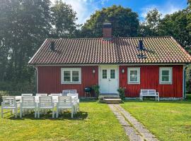 Nice Home In Agunnaryd With Kitchen, semesterhus i Agunnaryd