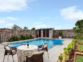 StayVista's La Villa Farm - Tranquil Retreat with Outdoor Pool, Games & Terrace
