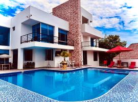 Villa campestre Casa Blanca Full House, holiday home in Agua de Dios