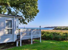 Finest Retreats - Ocean View, tradicionalna kućica u gradu 'Porchfield'
