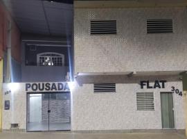 Pousada Quarto com tv,ar,frigobar,wifi e garagem, hotel a Aparecida